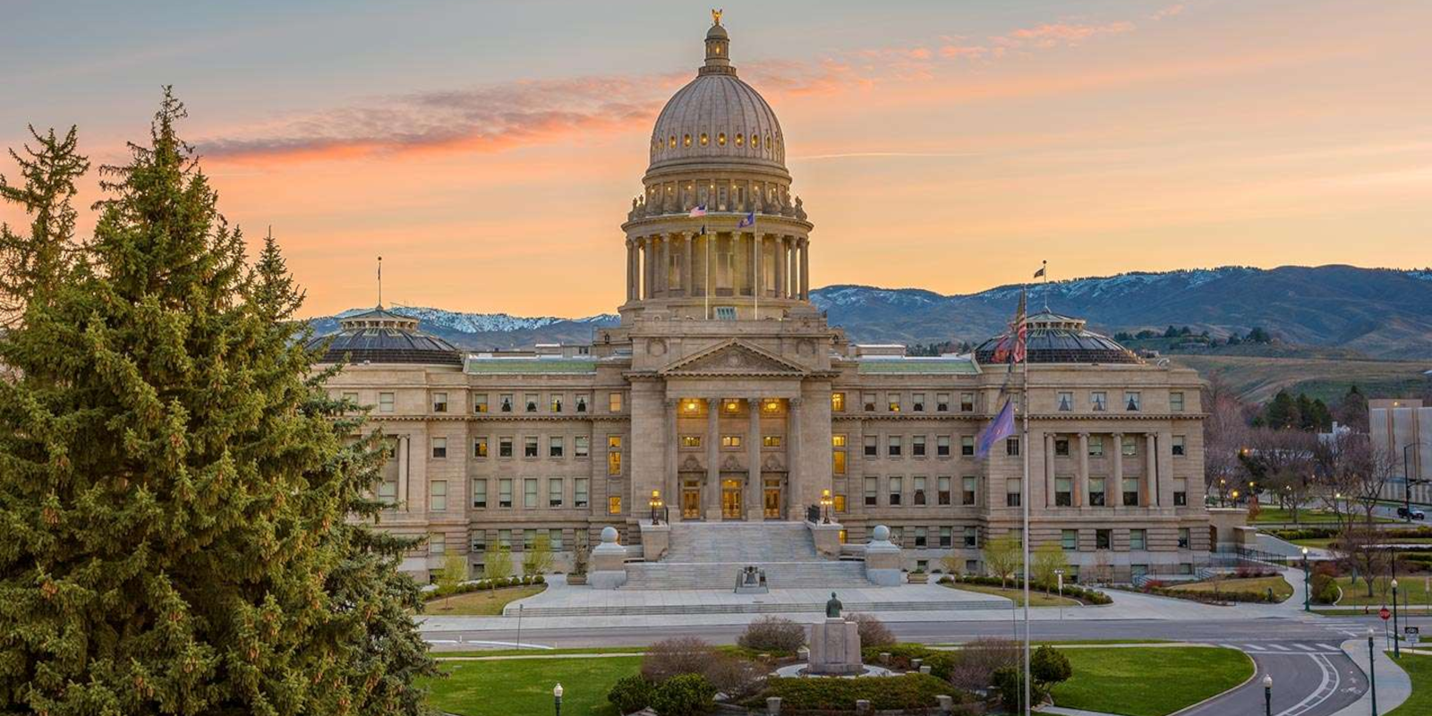 An Idaho legislative building at sunset
