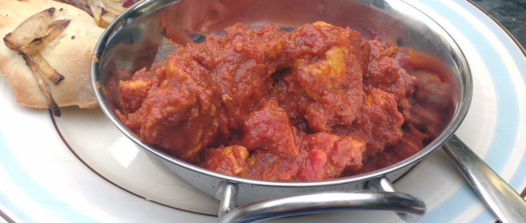 Delicious looking food in a metal bowl