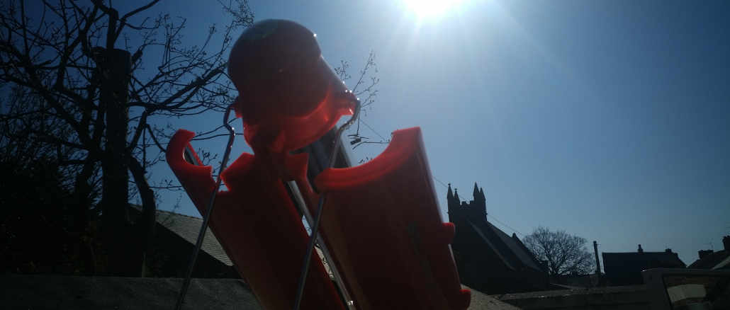 A solar kettle being heated by the sun