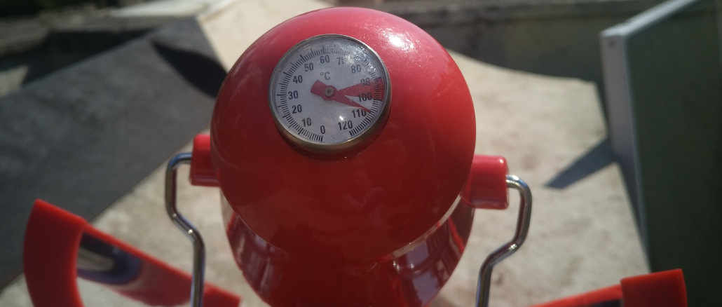 Solar kettle temperature gauge showing 110 Celsius