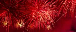 Red fireworks against a night sky