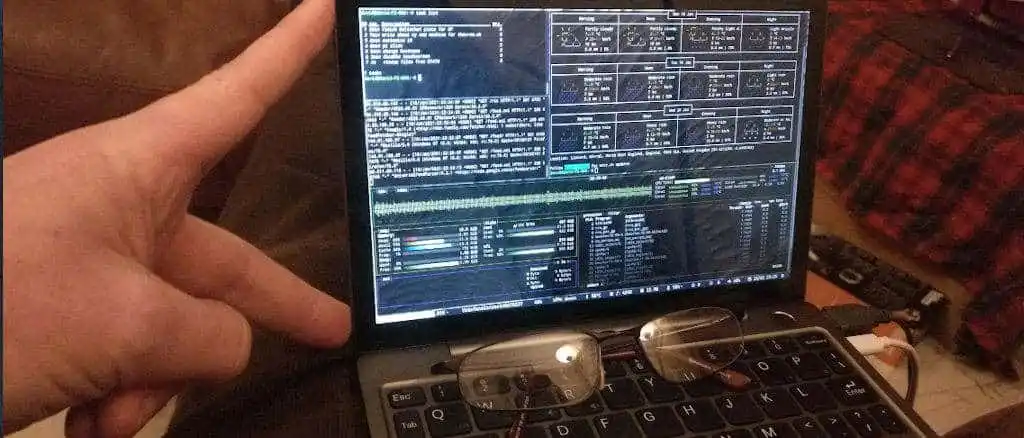 A GPD p2Max being spanned by two fingers