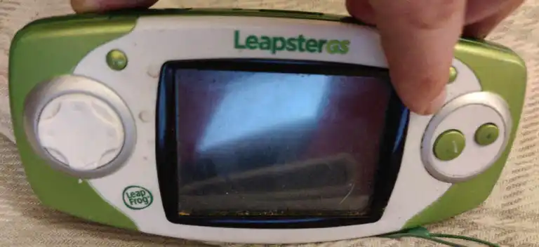 A dirty leapster GS held upright