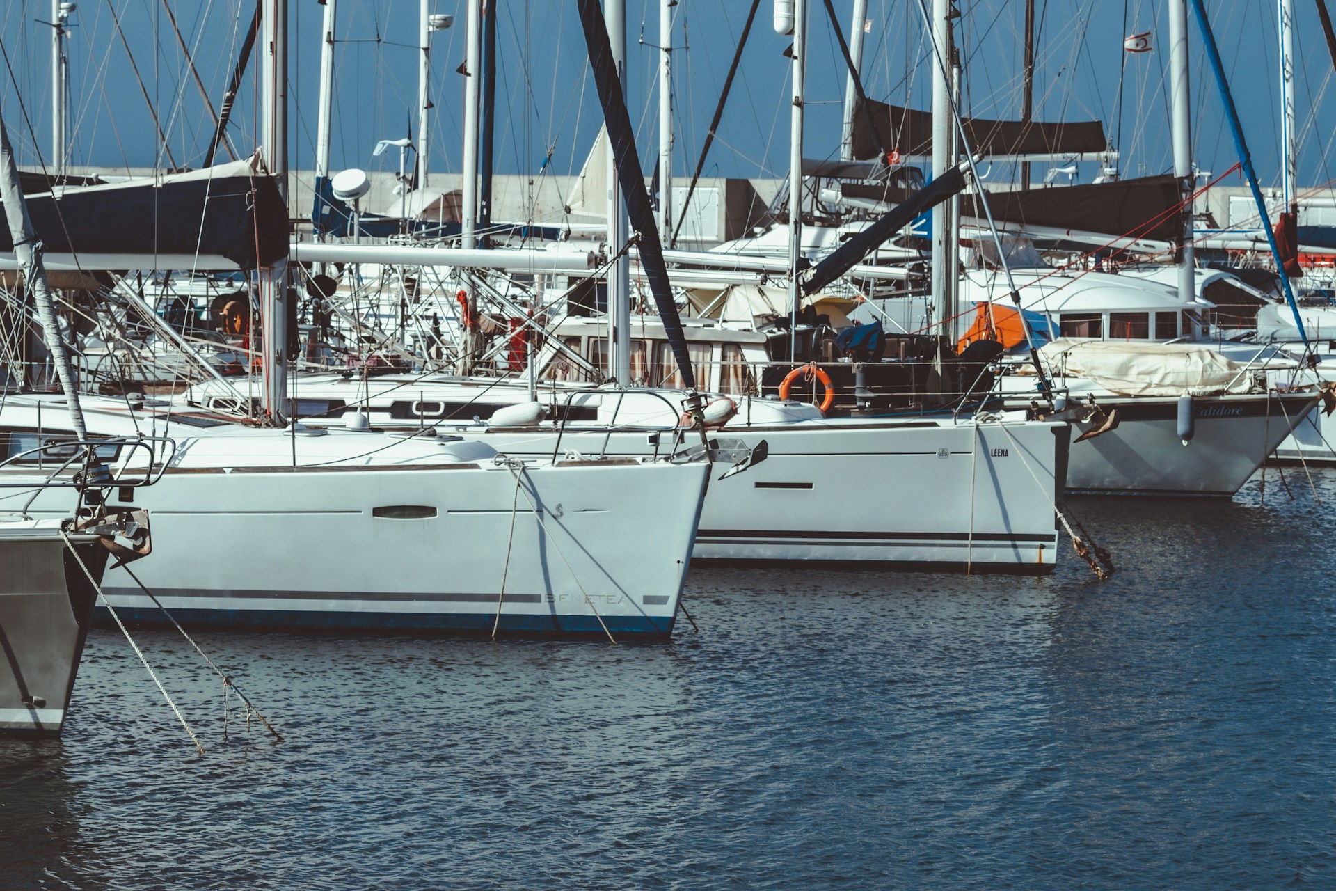 Sailing yachts tied at a dock