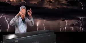 Ray Mazarek playing the organ against a lightning background