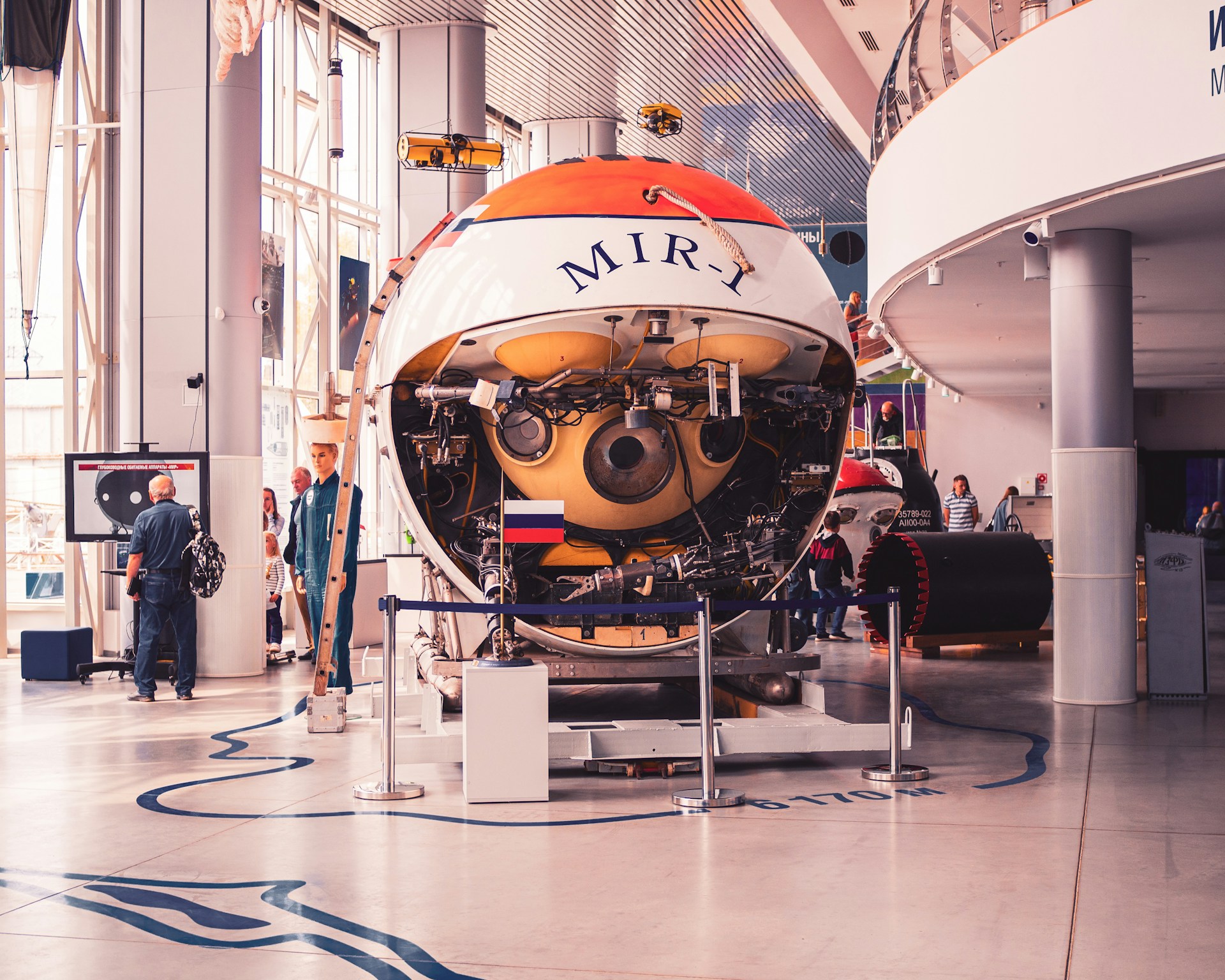 Submarine capsule in a warehouse