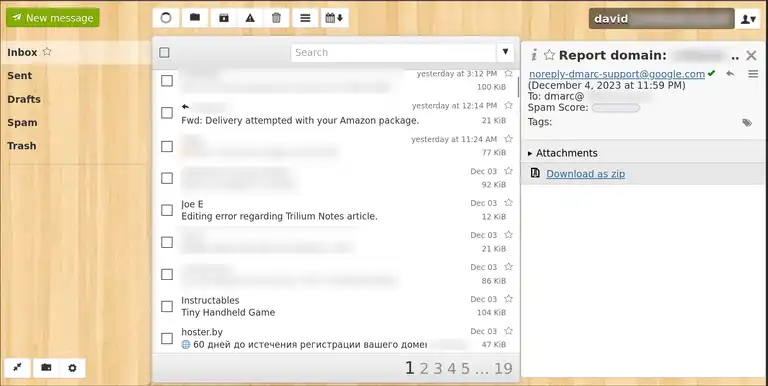 An email inbox with a snazzy wood-effect background