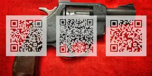 Three QR codes semi-transparent against a snub-nosed revolver on a red background