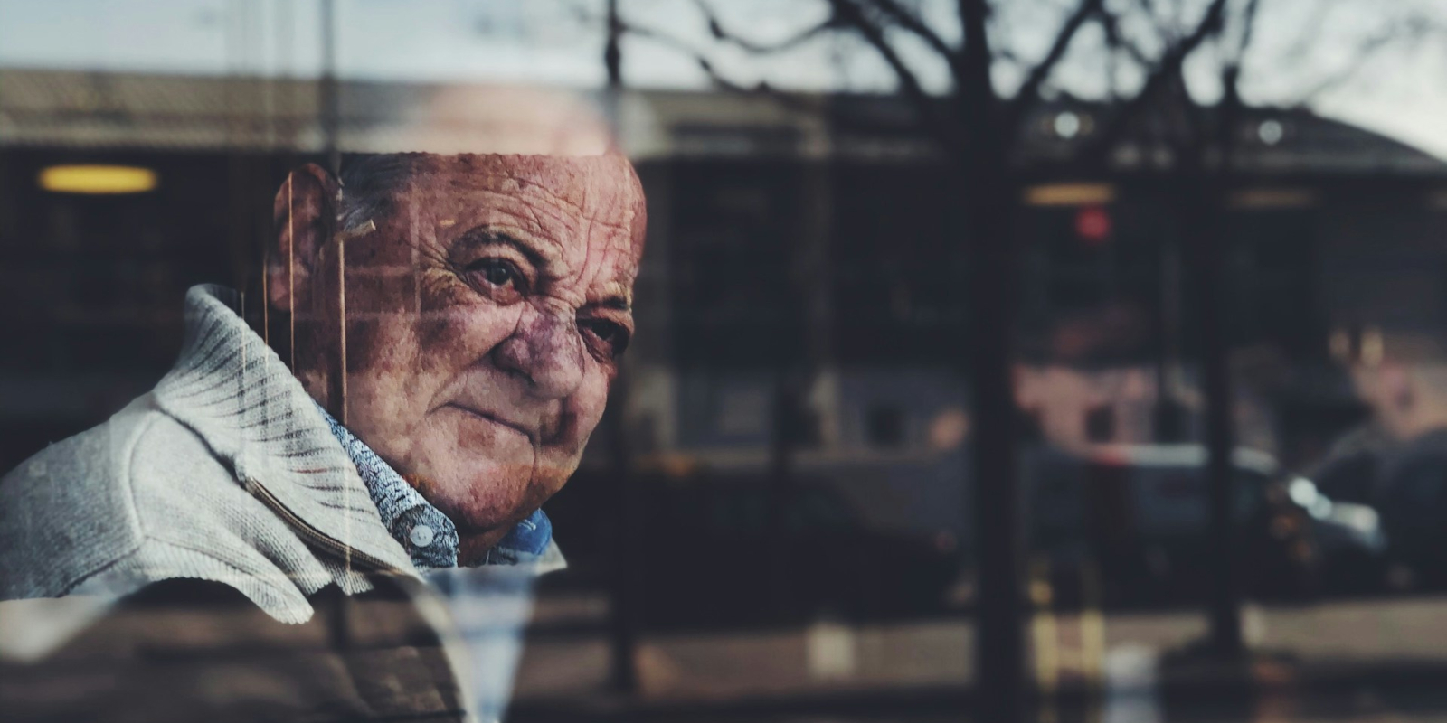 A man looking out of a window